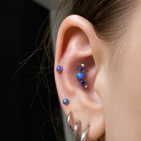 A cluster of lavender opals, white opals, and sparkly Amethyst CZ stones to complete your style! Ideal for helix and conch piercing
