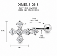 Titanium floating belly ring with cross design, 14g, from Body Clickers, shown in close-up on a model's abdomen.