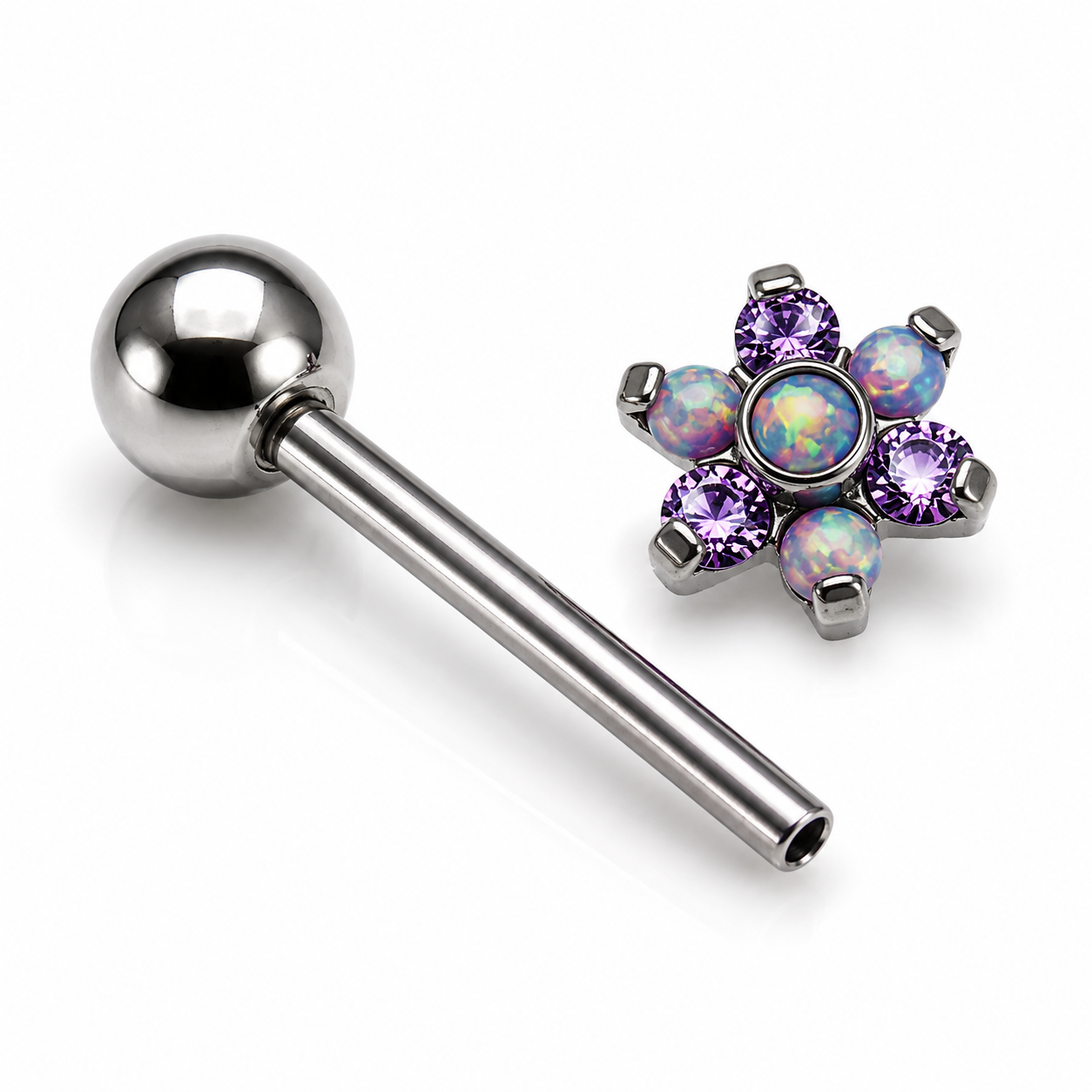 Purple flower-shaped opal tongue piercing in 14g body jewelry, featuring a vibrant purple flower design.