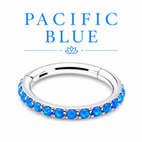 Silver ring with blue stones on a white background with 'Pacific Blue' branding.