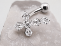 Titanium cross floating belly ring in 14g with a sleek design, ideal for body piercing by Body Clickers