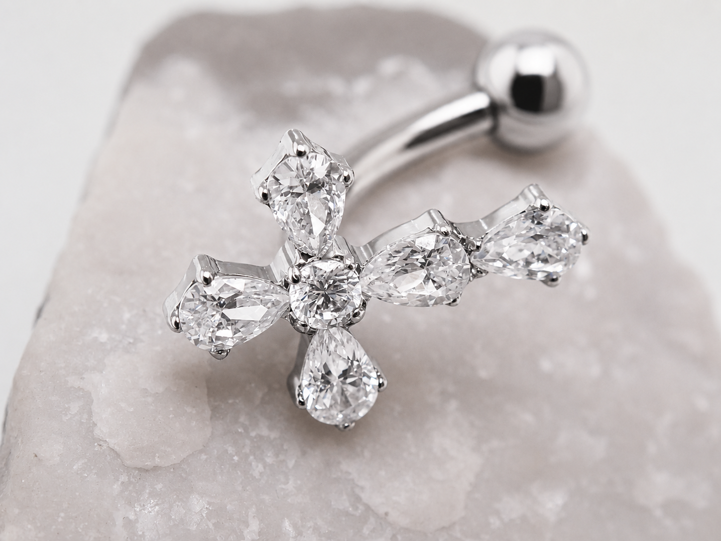 Titanium cross floating belly ring in 14g with a sleek design, ideal for body piercing by Body Clickers