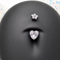 Titanium heart and flower CZ belly ring 14g body jewelry with intricate design and sparkling stones.