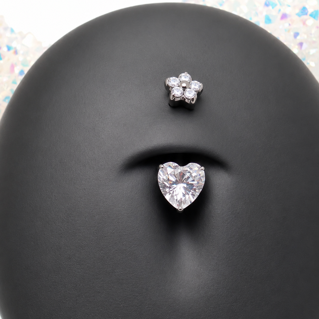 Titanium heart and flower CZ belly ring 14g body jewelry with intricate design and sparkling stones.