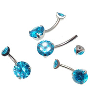 Aqua Prong CZ belly ring in 14g body jewelry by Body Clickers, featuring a blue gemstone and threaded design.