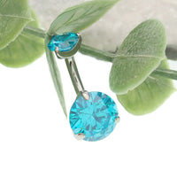 Aqua Prong CZ belly ring, 14g body jewelry by Body Clickers, displayed on a white background with shiny gemstone detail.