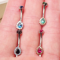 Titanium internally threaded 14g belly ring in multiple colors, body jewelry featuring a sleek and secure design.