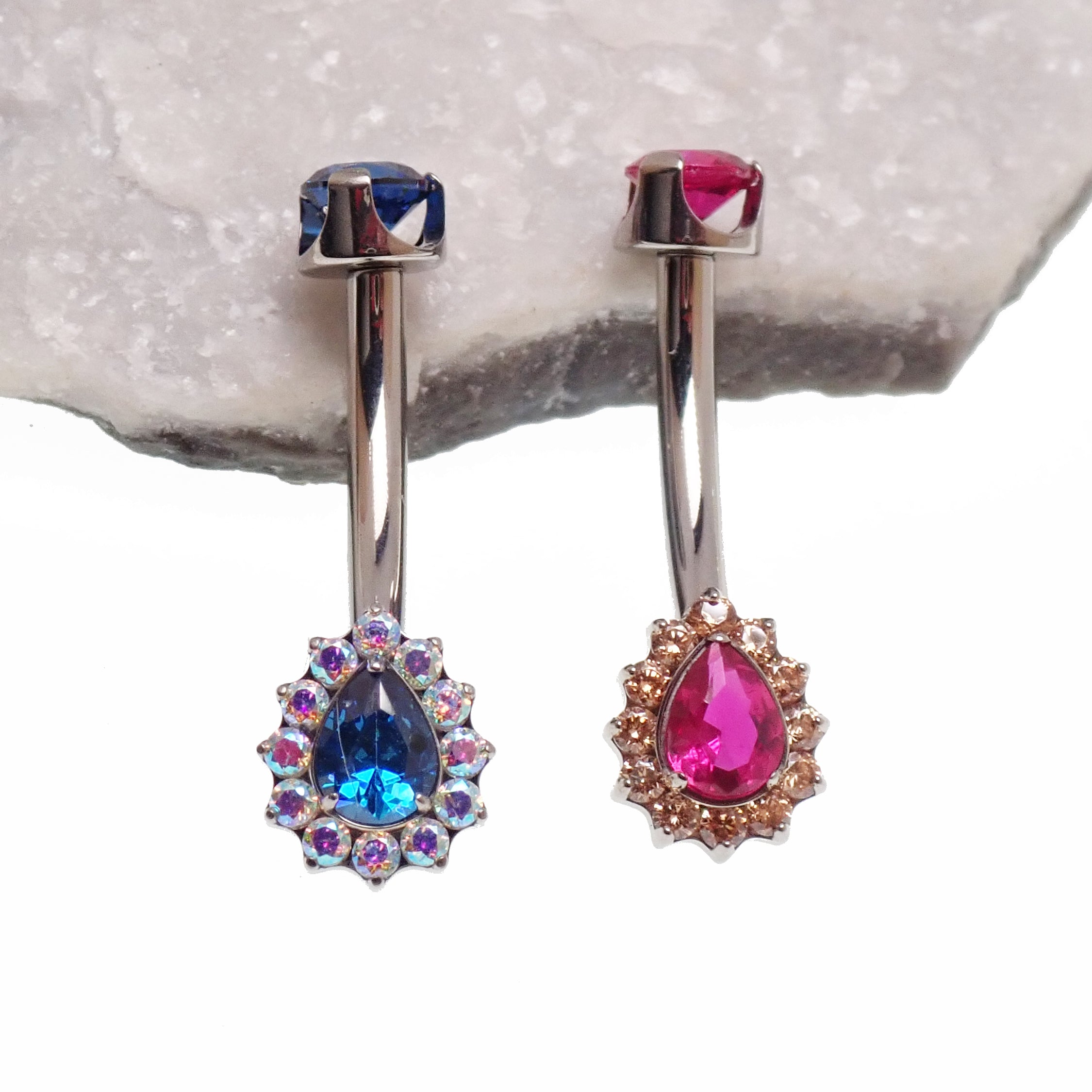 Titanium internally threaded 14g belly ring with blue and pink accents, Body Clickers Body Jewelry for belly piercing.