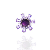 Amethyst and cubic zirconia cluster titanium flatback body piercing with vibrant purple stones and sparkling accents.
