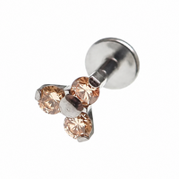 Champagne-colored Body Clickers flat-back cluster earrings with three dangling pearl-like beads, 18g, 6mm size.
