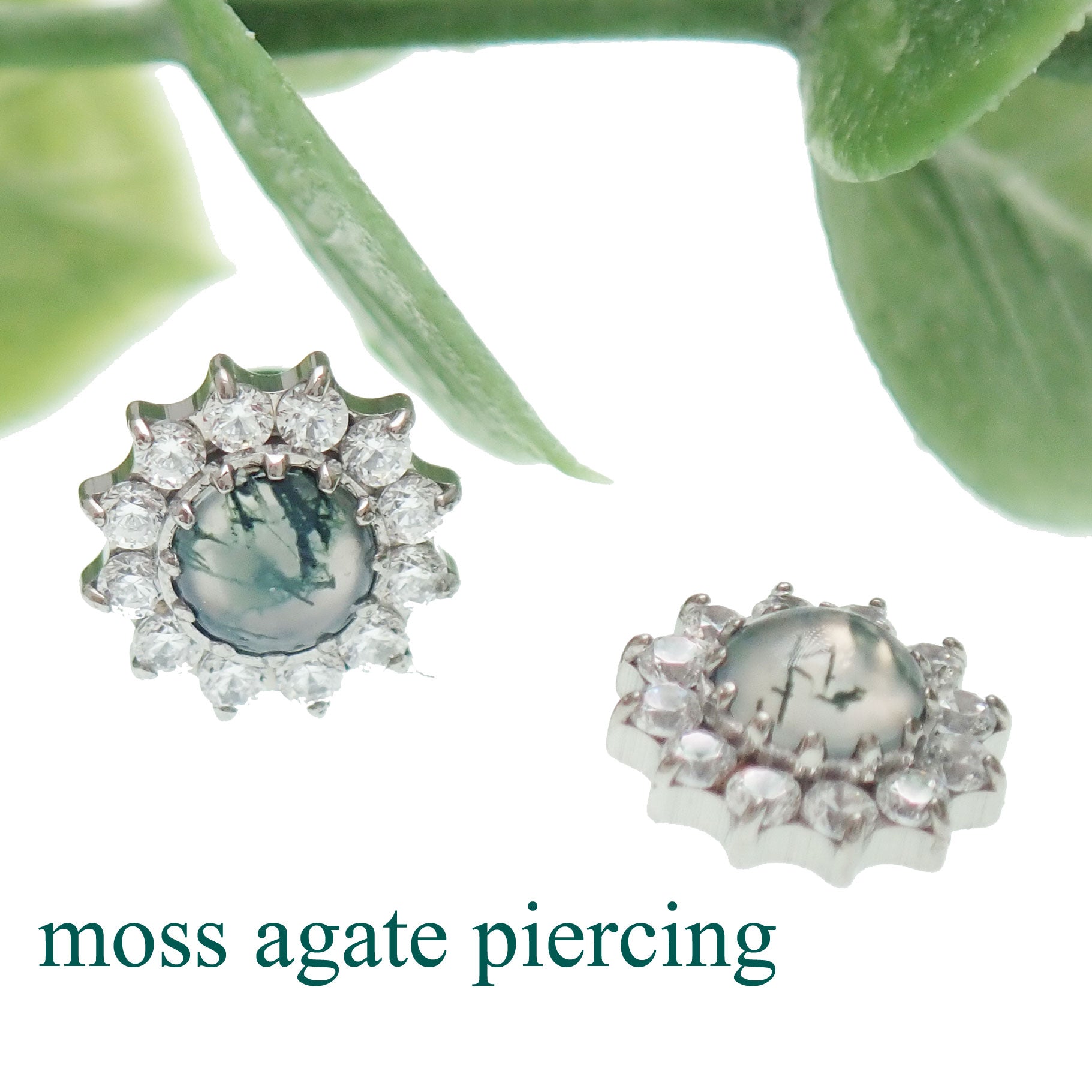 18g Moss Agate natural stone and CZ flatback body clickers earring with silver-tone setting, featuring green and brown hues.