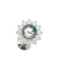 18g Moss Agate natural stone and CZ flatback body jewelry by Body Clickers, featuring a smooth, polished gemstone and sparkling cubic zirconia.