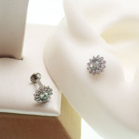 18g Moss Agate natural stone and CZ flatback body jewelry by Body Clickers showing the smooth, polished stone and sparkling cubic zirconia.