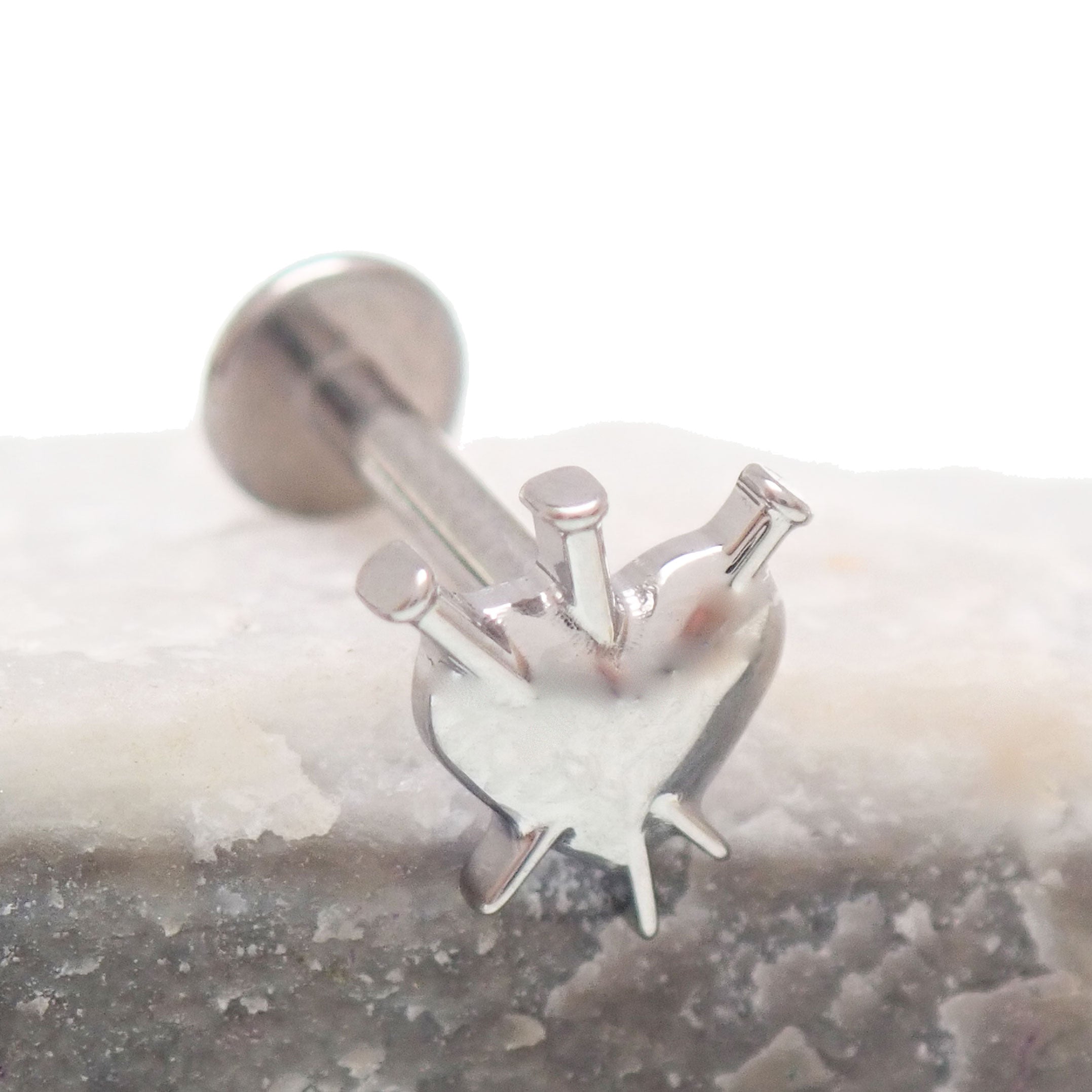 Titanium flatback nailed heart implant piercing in 18g with internal threading, 6mm size, by Body Clickers.