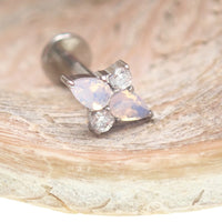 Rose quartz cluster titanium flatback piercing in 18G with 6mm size, featuring a sparkling pink gemstone and flatback design.