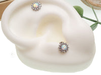 White fire opal and cubic zirconia flatback body jewelry by Body Clickers, 18g, 6mm size, featuring sparkling gemstones.