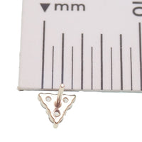 14k Trinity and titanium flatback push-fit piercing jewelry by Body Clickers, featuring a stylish magpie design.