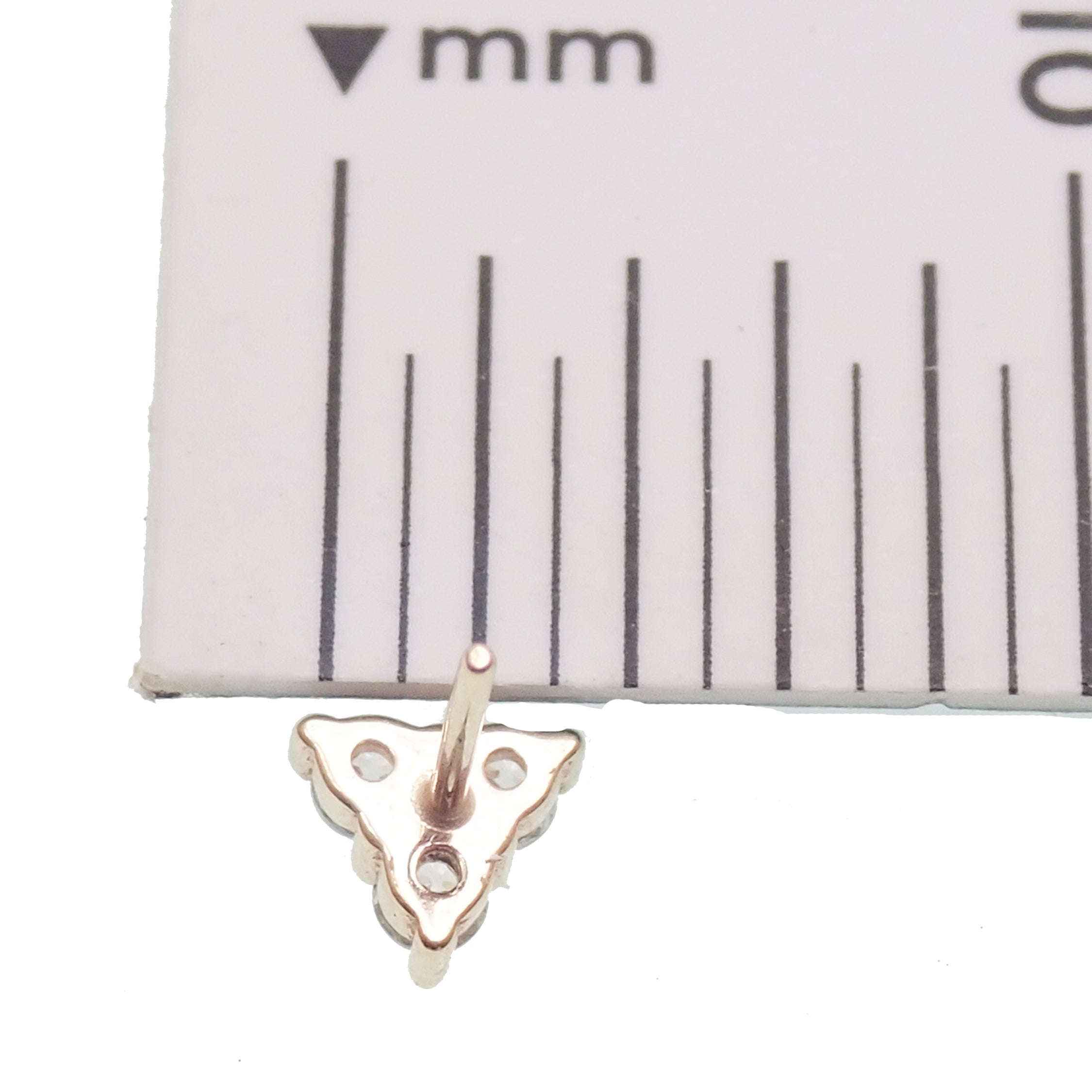 14k Trinity and titanium flatback push-fit piercing jewelry by Body Clickers, featuring a stylish magpie design.