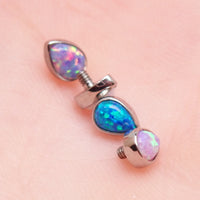 Body Clickers opal teardrop implant titanium internally threaded top in 14g, featuring a vibrant bubblegum pink and white opal design.