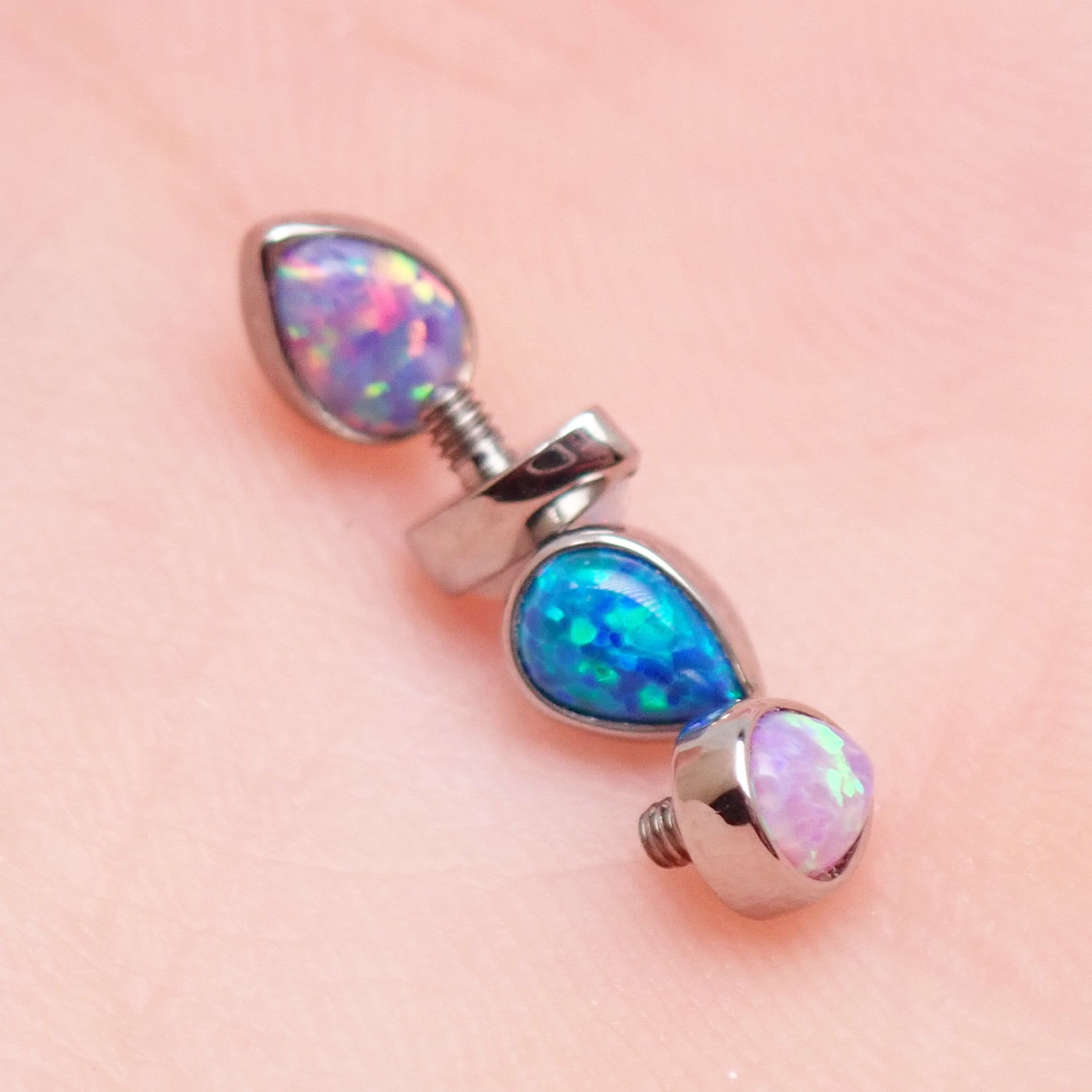 Body Clickers opal teardrop implant titanium internally threaded top in 14g, featuring a vibrant bubblegum pink and white opal design.