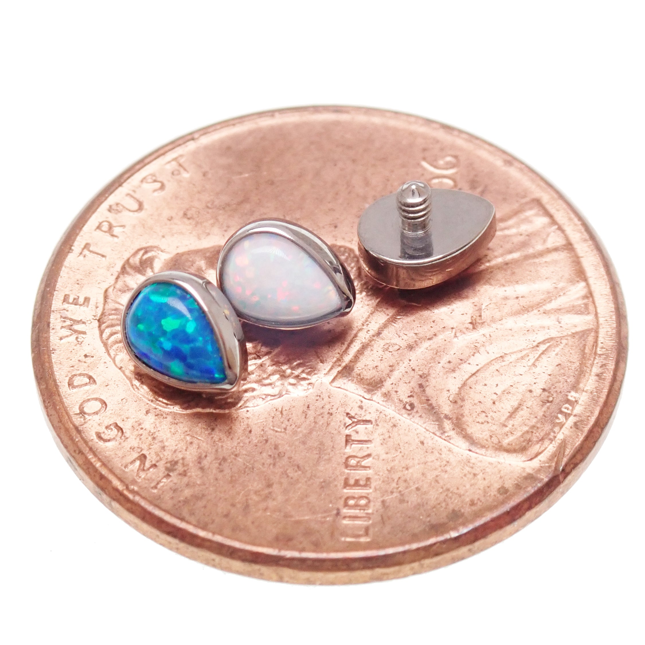 Body Clickers opal teardrop implant titanium internally threaded tops in 14g, featuring a bubblegum-colored teardrop design.