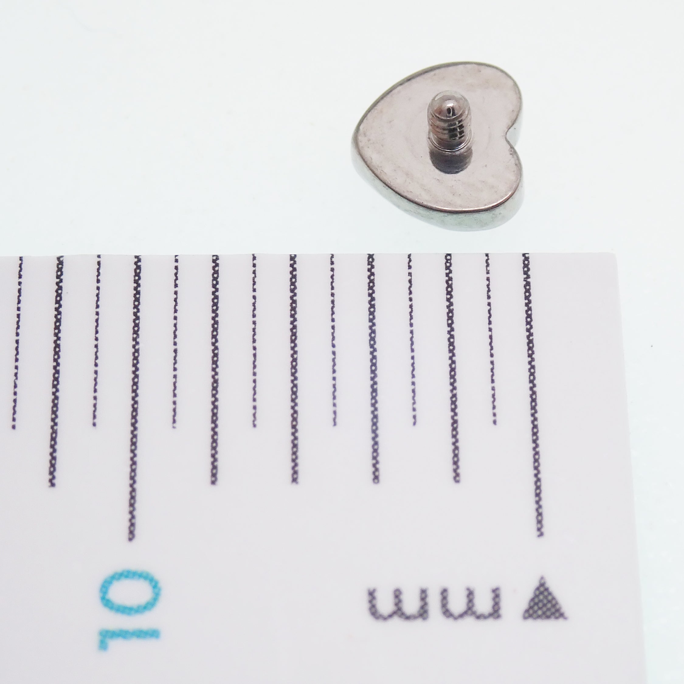 Opal Heart Dermal Top by Body Clickers in angel skin, 14g (1.2mm thread), with a polished heart-shaped opal design.
