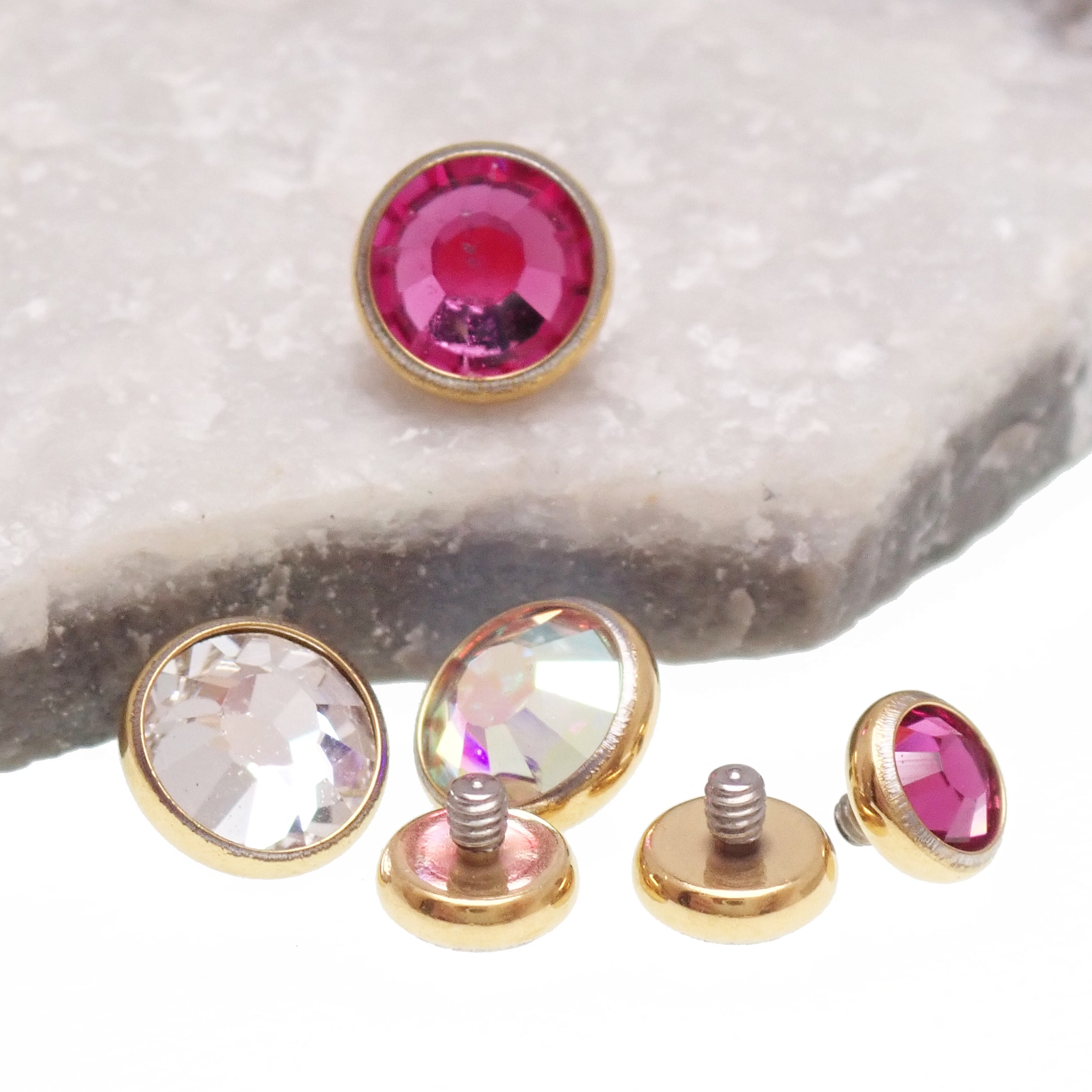 PVD Gold Cerise and AB Rainbow clear CZ implant titanium internally threaded body clicker attachment in 14g.