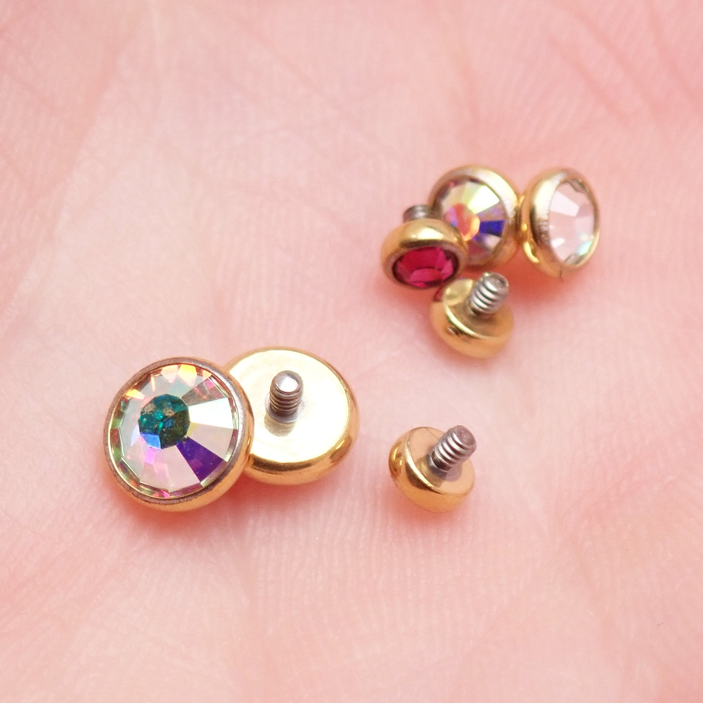 PVD Gold Cerise and AB Rainbow Clear CZ implant titanium internally threaded top attachment for 14g body jewelry by Body Clickers.