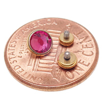 PVD gold cerise and AB rainbow clear CZ implant titanium internally threaded body jewelry attachment for 14g piercings.