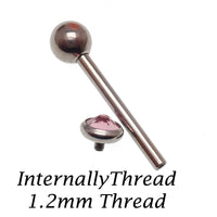 Pink or green CZ tongue barbell piercing by Body Clickers, 14g titanium with colorful cubic zirconia accents.