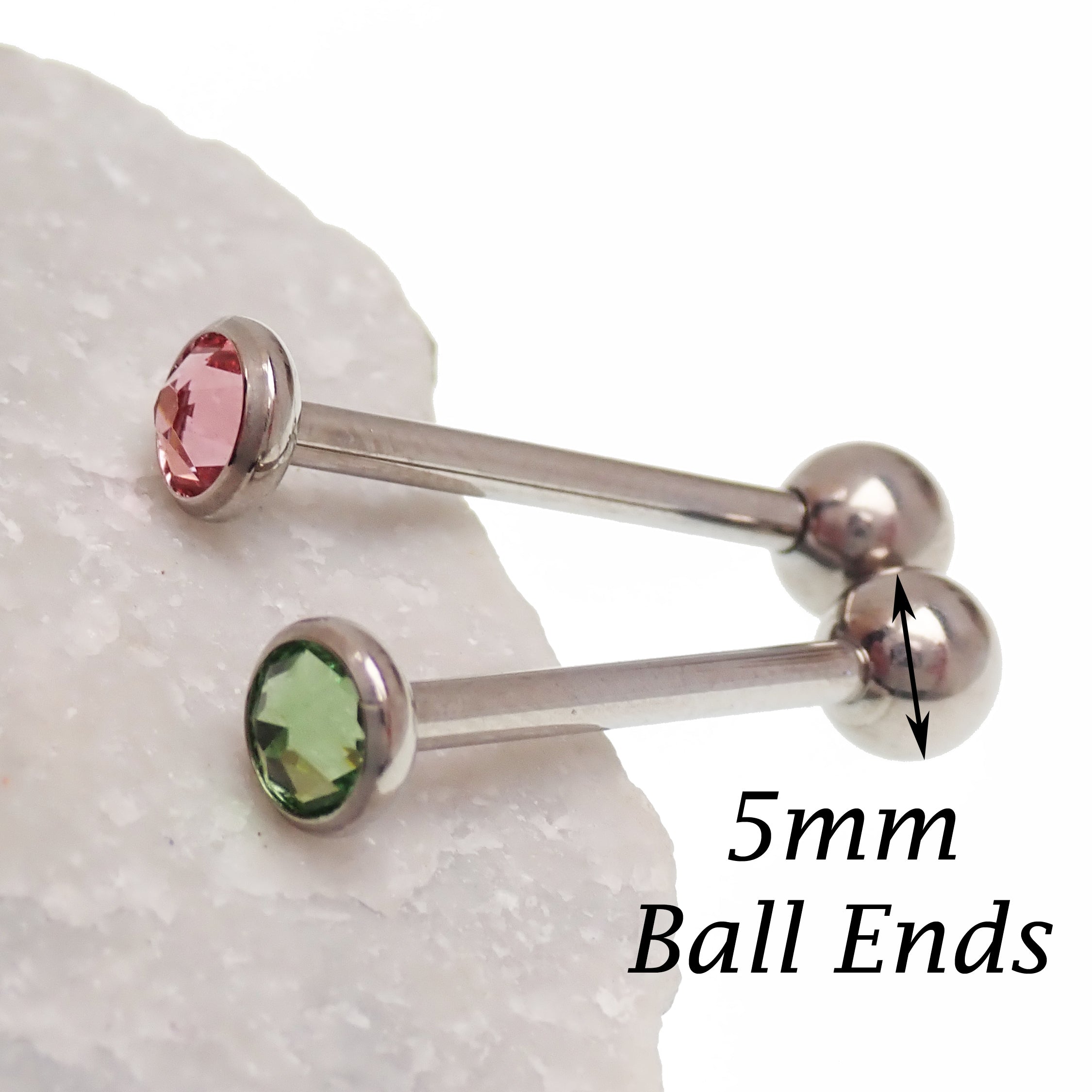 Green or pink CZ tongue barbell piercing by Body Clickers, 14g titanium jewelry with colorful cubic zirconia stones.