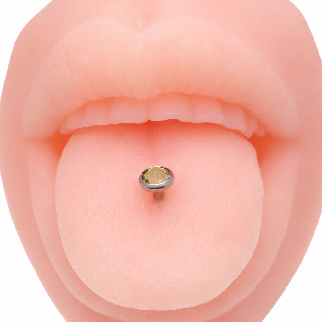 Pink or green CZ tongue titanium barbell piercing by Body Clickers, 14g, with colorful cubic zirconia stones.