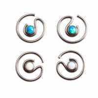 Peacock blue spiral titanium BCR ring with opal accents, 16g body jewelry from Body Clickers, designed for nose or ear piercing.