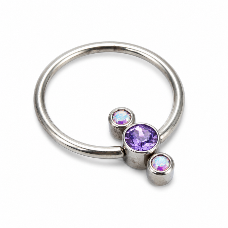 Black Tanzanite and AB crystal 3-stone cluster titanium ring for body jewelry, featuring a sleek design and 16g gauge.