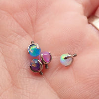 Pink jelly opal nipple jewelry by Body Clickers Body Jewelry, 12g gauge and 12mm size, with a smooth, rounded design.