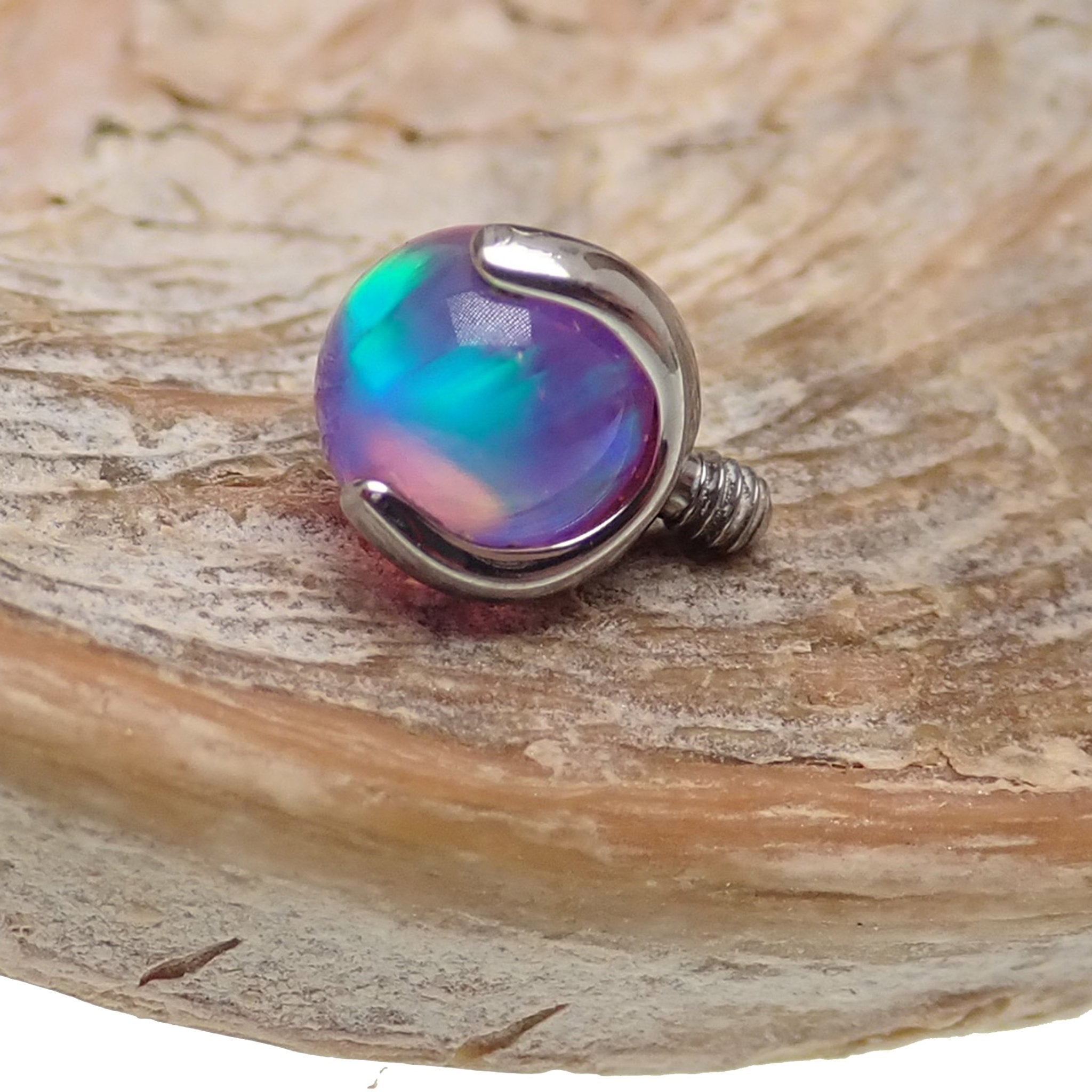 Pink jelly opal nipple jewelry by Body Clickers featuring 12G gauge and 12mm size, with a vibrant pink gemstone.