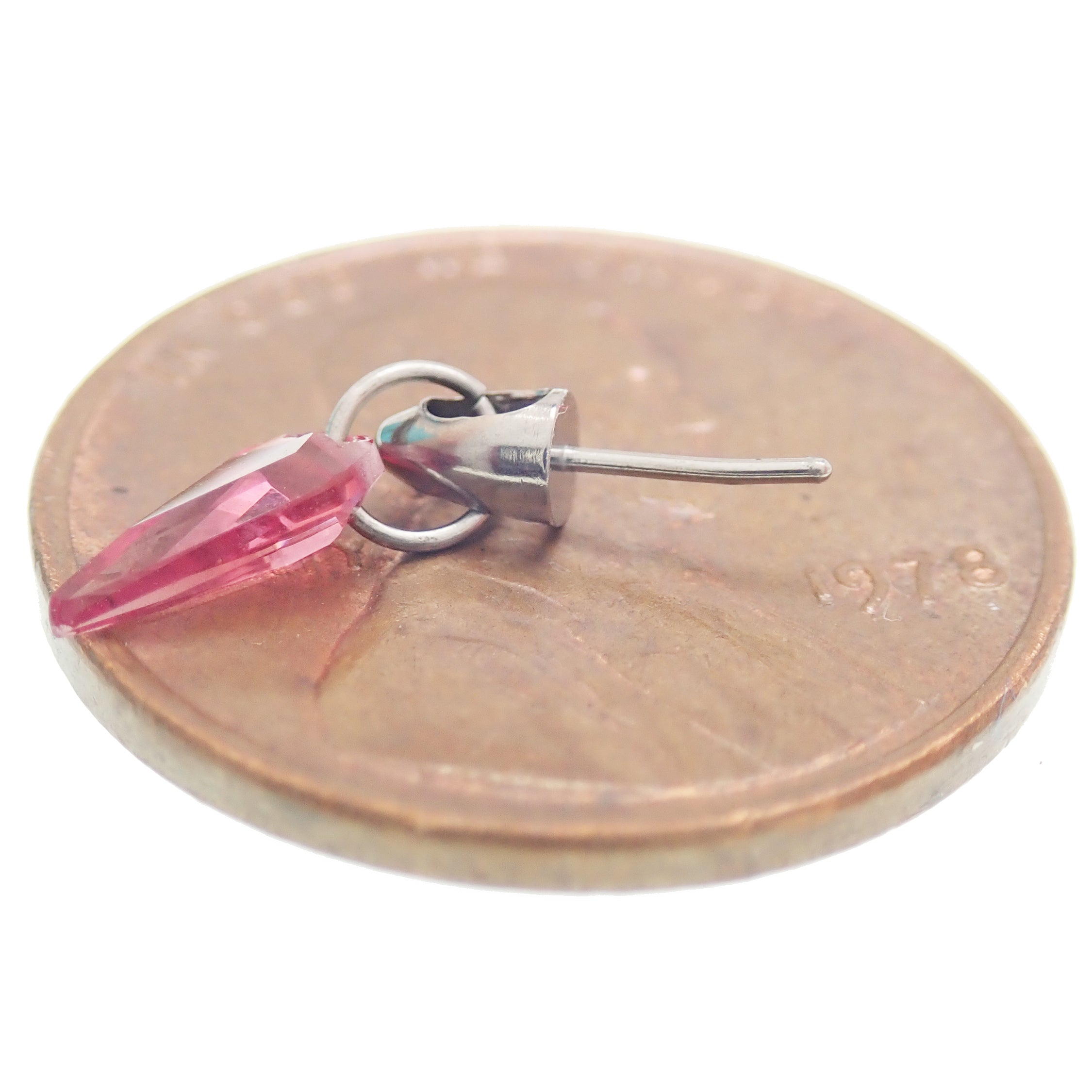 Pink titanium nipple bar with CZ dangle, available in 12g, 14g, and 16g, featuring push fit body jewelry design by Body Clickers.