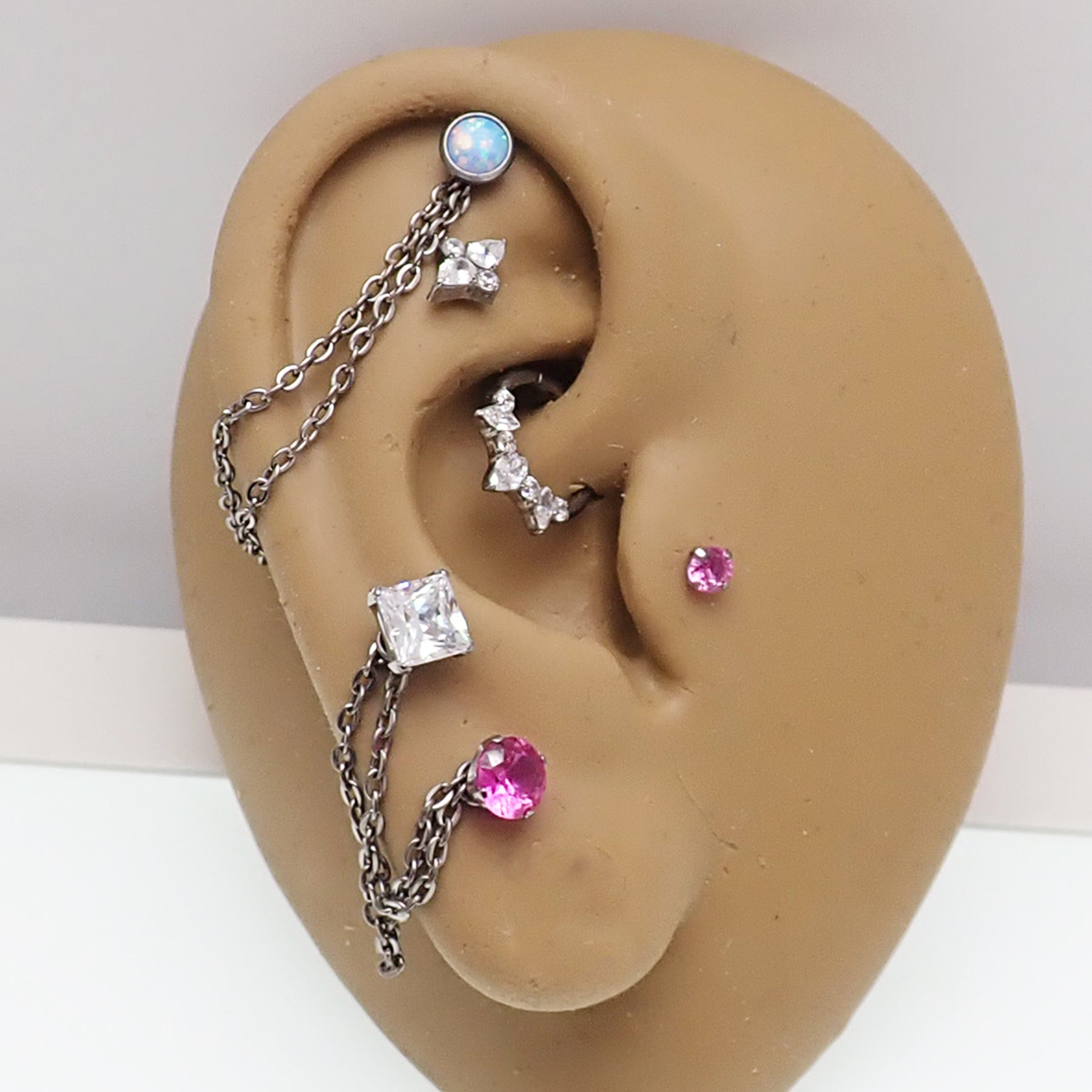 Double titanium add-on piercing chain from Body Clickers Body Jewelry, featuring sleek silver links for body piercing adornment.
