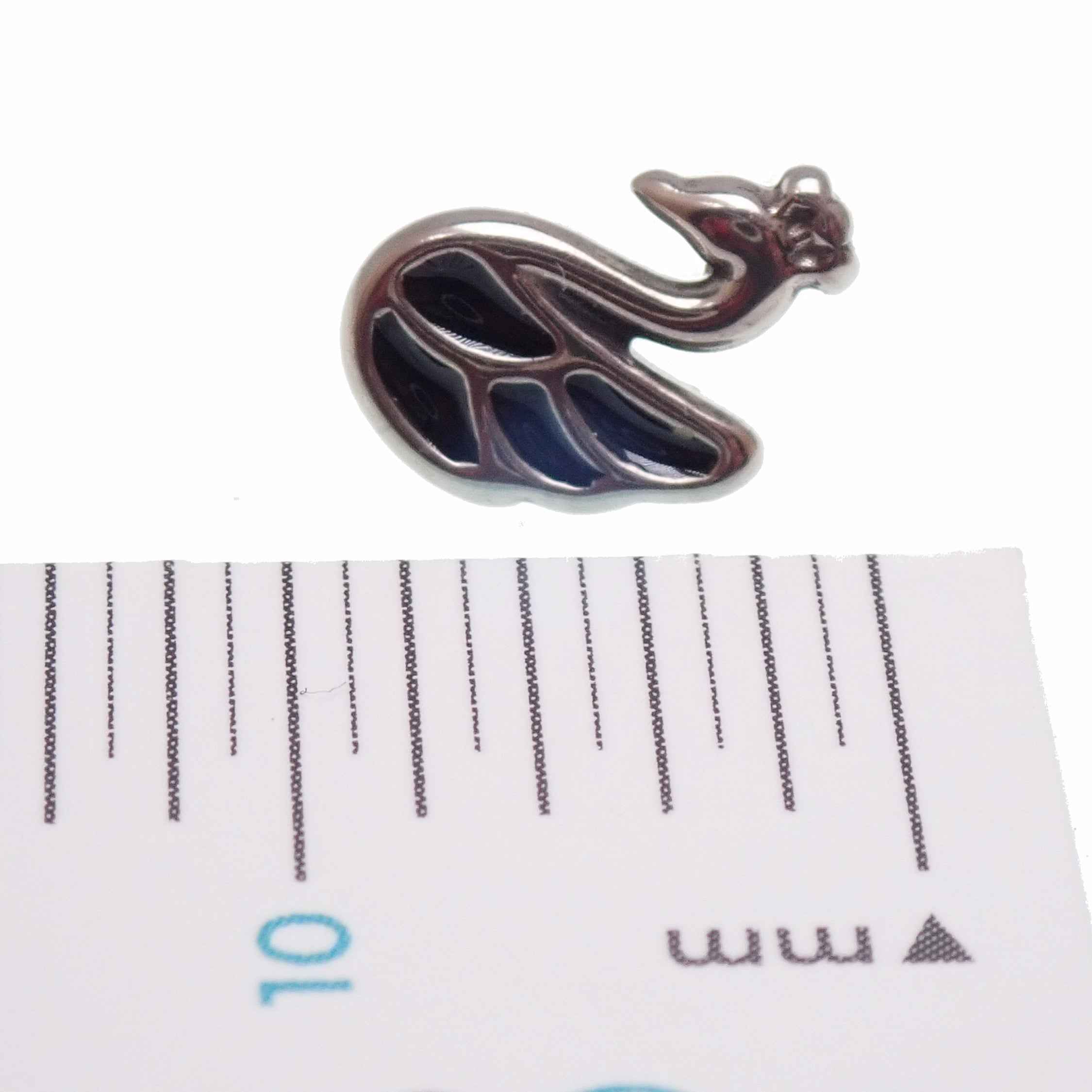Titanium flat back implant-grade body jewelry by Body Clickers, 20g to 14g, with push fit threadless tops and duck-shaped design.