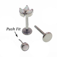 Set of four Body Clickers titanium implant flatback earrings with opal peacock blue push-fit design in 14g to 20g gauges.
