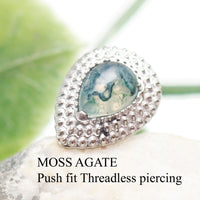 Titanium push-fit teardrop piercing with Moss Agate, Garnet, or Moonstone, featuring a single stud design by Body Clickers Body Jewelry.