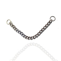 Titanium flat nose and ear chain add-on by Body Clickers Body Jewelry, featuring sleek design and secure attachment.