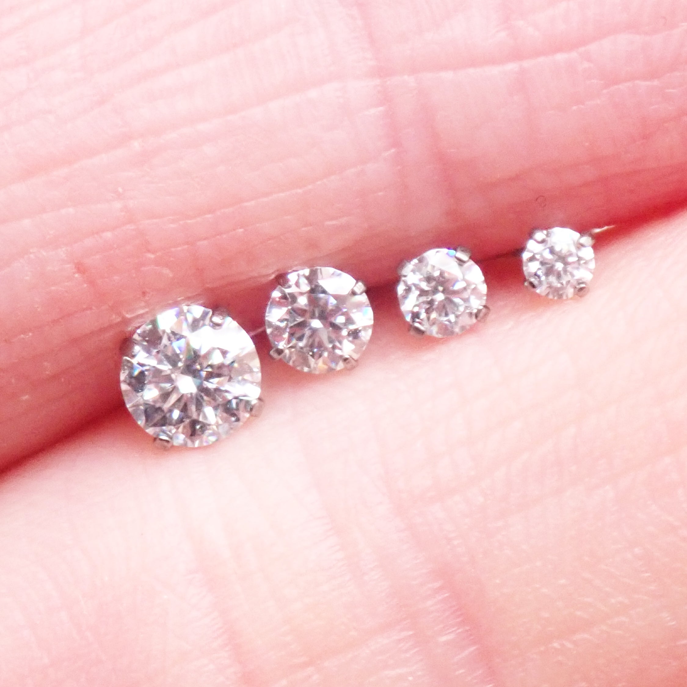 Moissanite implant grade titanium flatback earring with 3mm stone and 20g gauge, internally threaded, push-fit design.