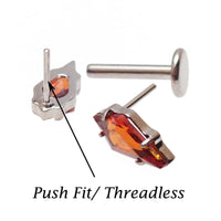 Implant grade titanium push-fit threadless piercing with a 5mm garnet stone flatback from Body Clickers Body Jewelry.
