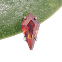 Titanium push-fit threadless piercing with a 5mm garnet stone and flatback design by Body Clickers Body Jewelry.