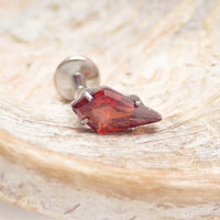 Implant grade titanium push-fit threadless piercing with a 5mm garnet stone flatback, by Body Clickers Body Jewelry.
