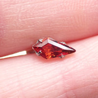 Titanium push-fit threadless piercing with a 5mm garnet stone flatback, designed for body jewelry by Body Clickers.