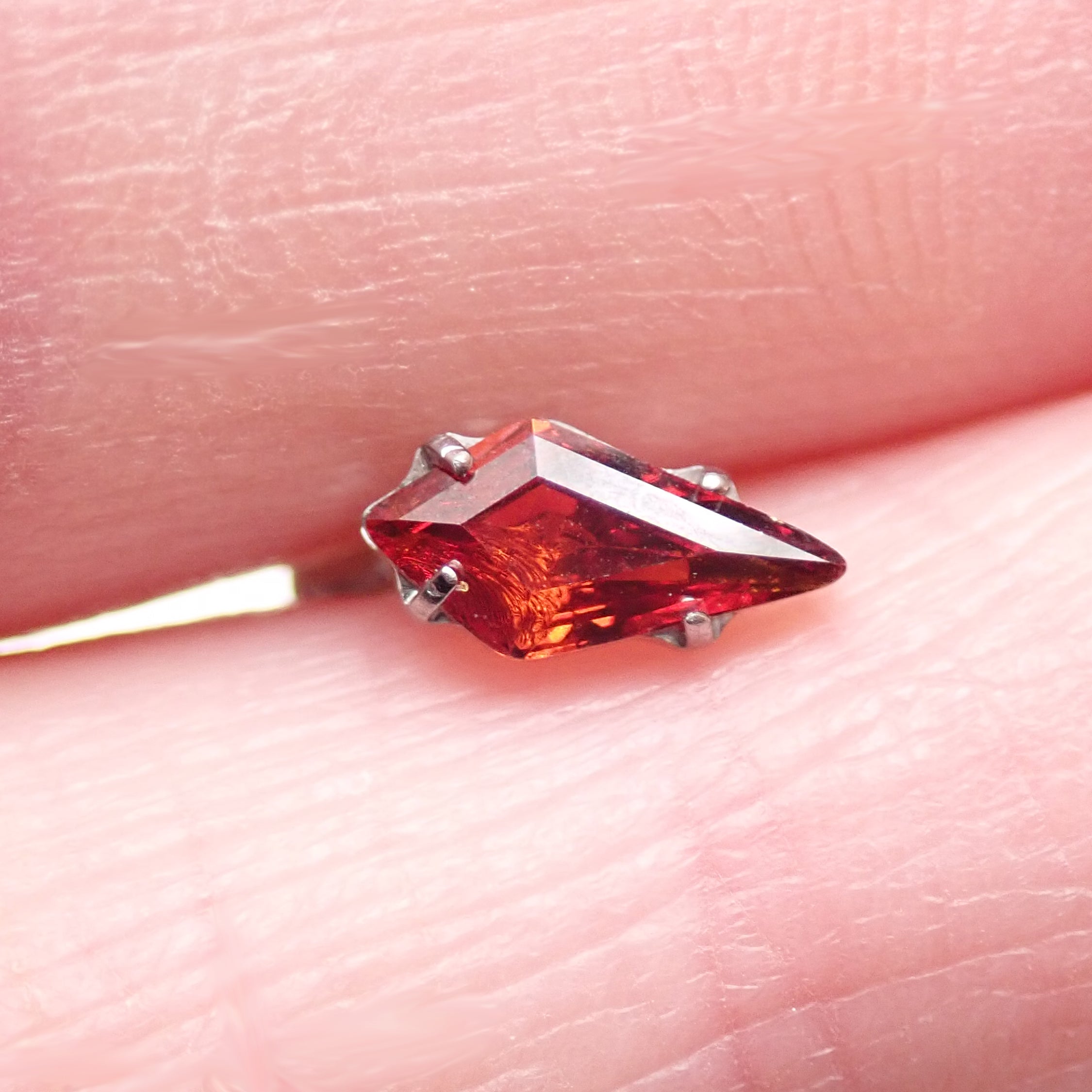 Titanium push-fit threadless piercing with a 5mm garnet stone flatback, designed for body jewelry by Body Clickers.