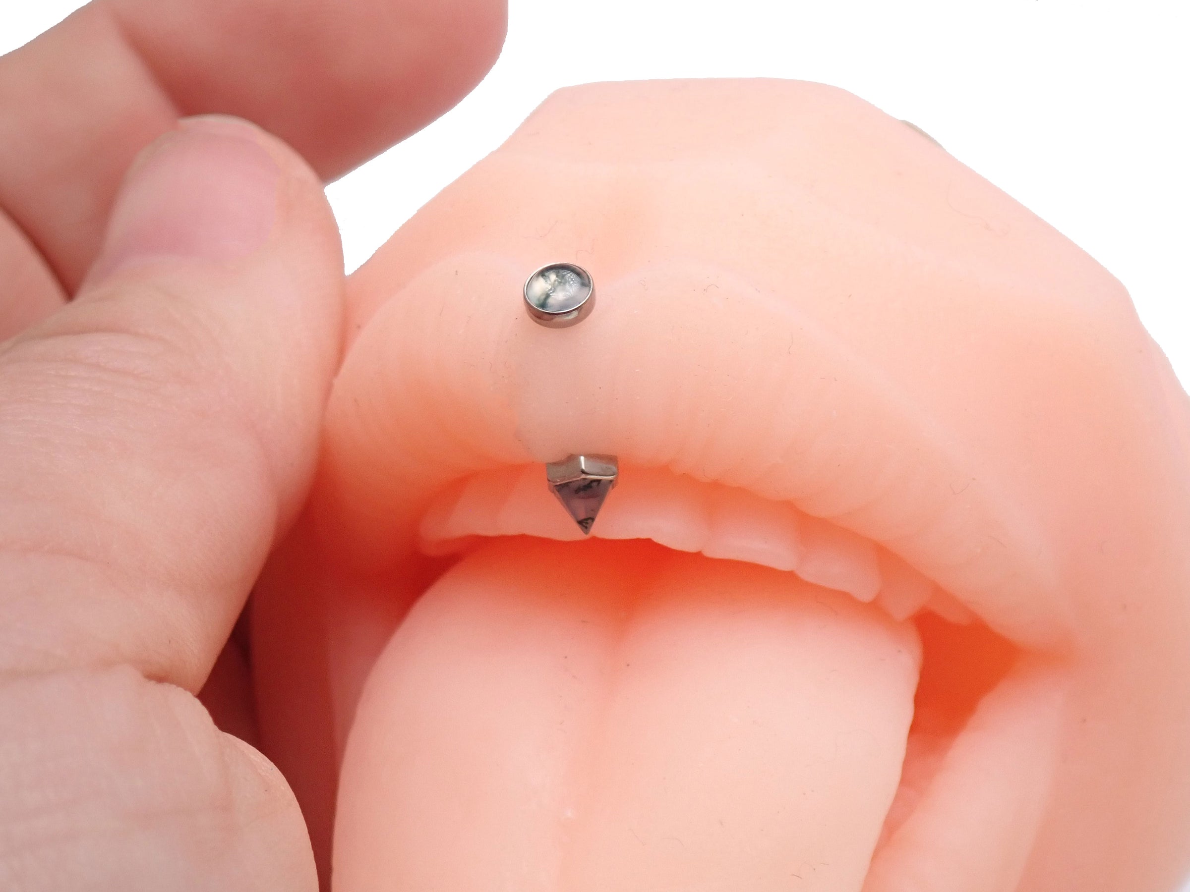 16G Moss Agate curved barbell by Body Clickers, implant grade titanium, internally threaded, with a polished moss agate stone.