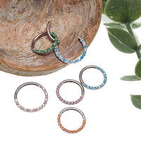 Green opal and CZ front titanium clicker body jewelry in 16g with 8mm diameter, from Body Clickers.
